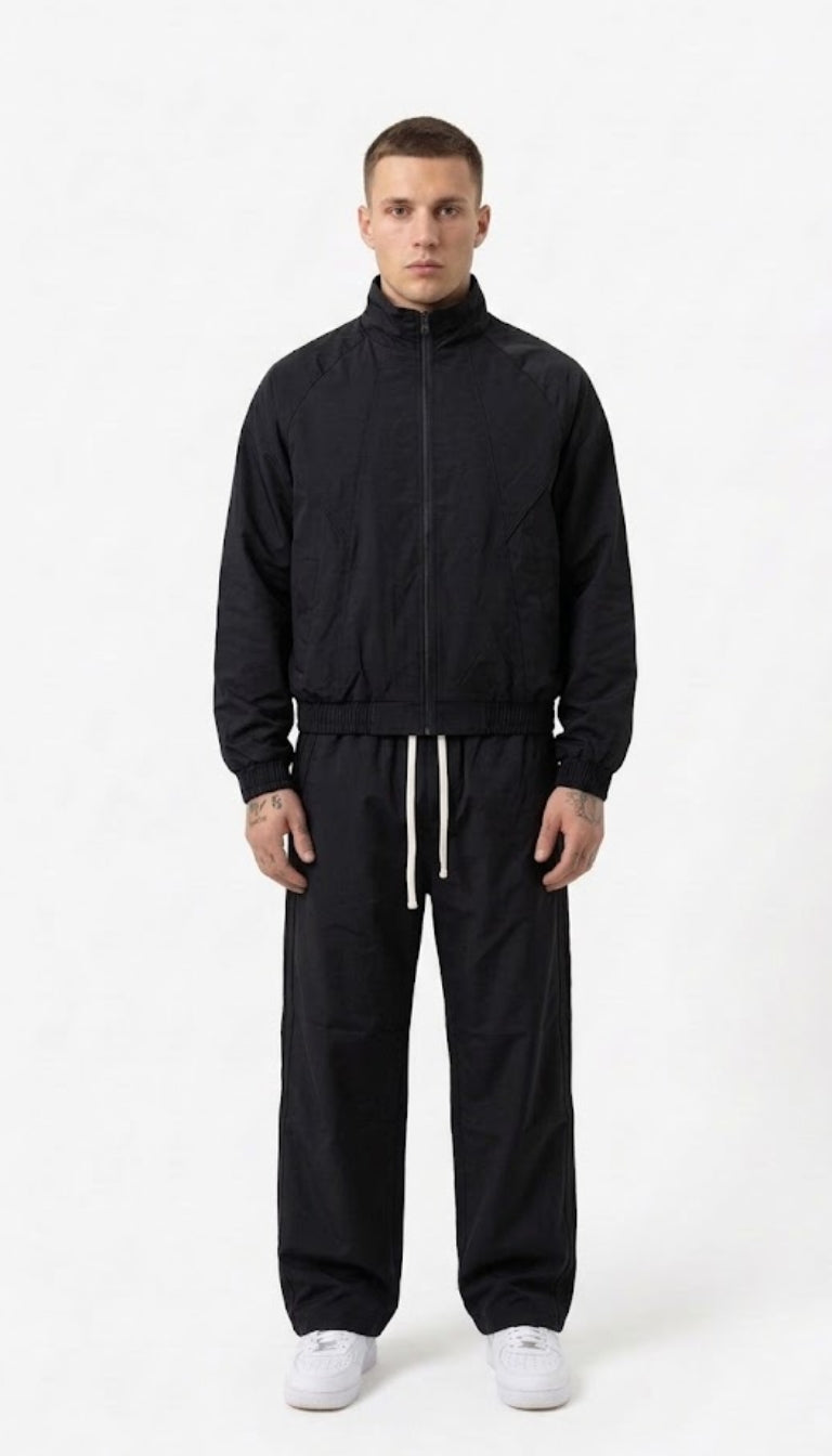 Coordinato con giacca a zip e pantaloni con coulisse