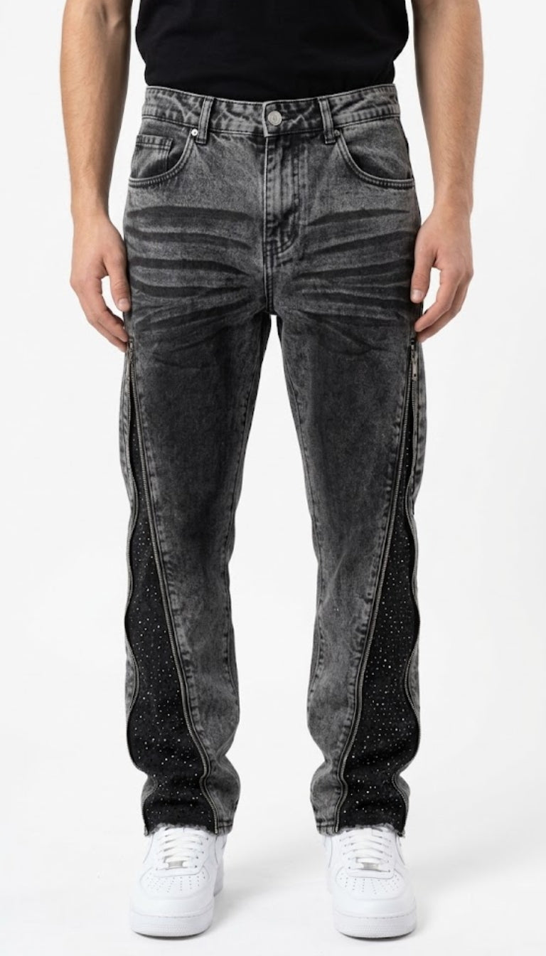 Pantaloni in denim slavato con zip e inserti in strass